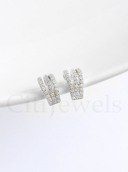 FELIX Z DESIGNS - S925 CZ Claw Stud Earrings: Silver
